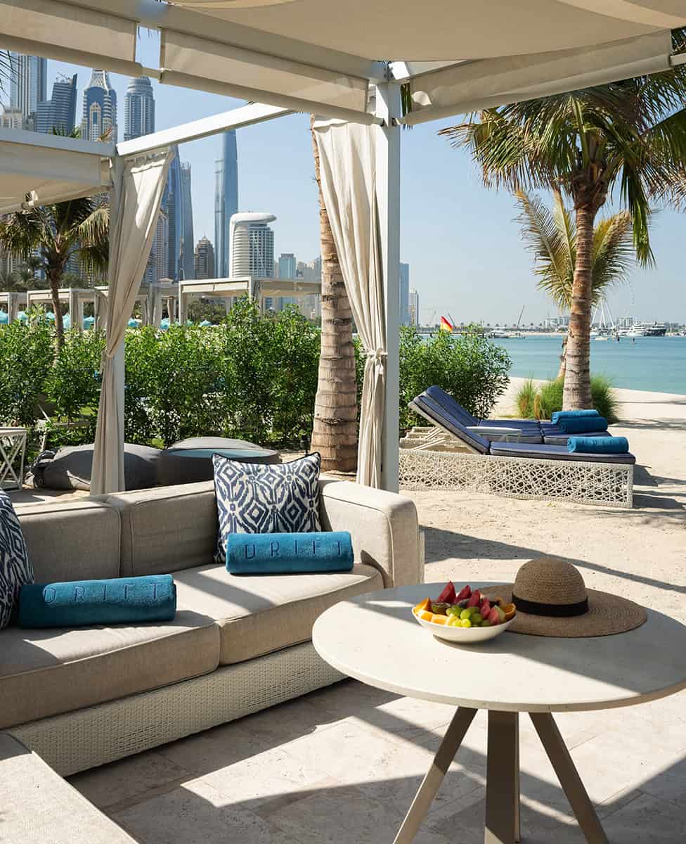 Book a Island Bed in Drift Pool Beach club.